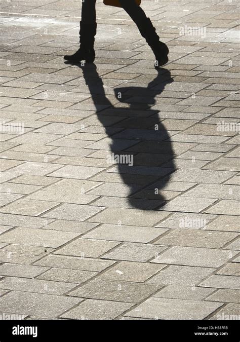 shadow of man walking Stock Photo - Alamy
