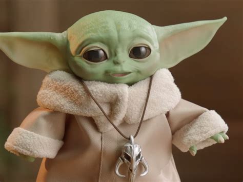 Hasbro released images of their new animatronic Baby Yoda figure, which will be available for ...