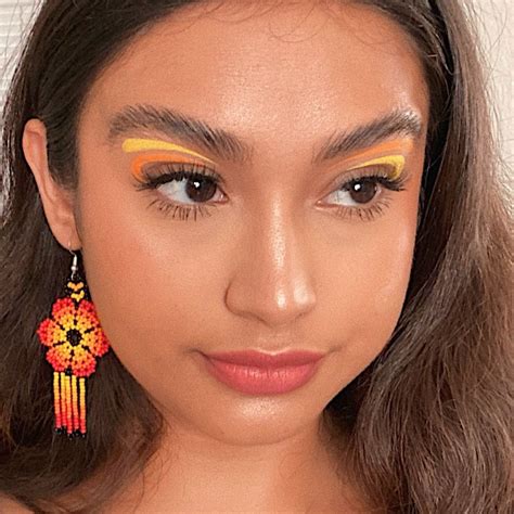 Orange and Yellow Graphic Eyeliner Makeup Inspiration