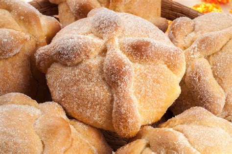 Sweet bread called Bread of the Dead (Pan de Muerto) enjoyed during Day of the Dead festivities ...