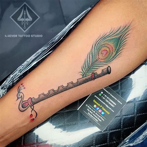 Discover 62+ flute with peacock feather tattoo best - in.coedo.com.vn