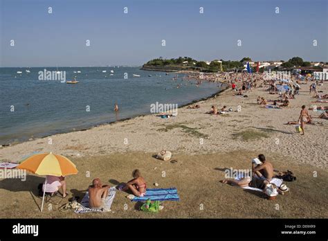 TOURISTS SWIMMING OR SUNBATHING ON THE BEACH OF SAINT-MARTIN DE RE Stock Photo, Royalty Free ...