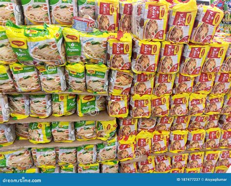 Various Brands of Instant Noodles in a Commercial Packages Stacked for Sale on the Display ...