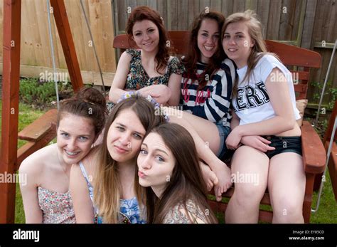 Happy group of teenage girls Stock Photo - Alamy