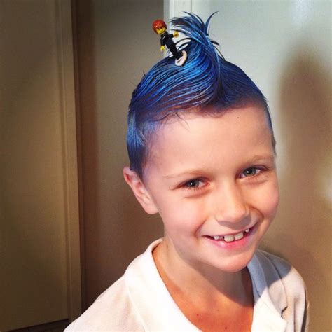 Great idea for crazy hair day for the boys. Spray hair blue and style into a wave and bobby pin ...