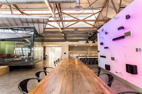 Wood, light, open collaborative space, with company specific technologies built into the design ...