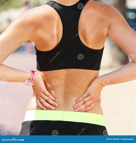 Sports Injury - Lower Back Pain Woman Holding Body Stock Photo - Image of jogging, jogger: 53135556