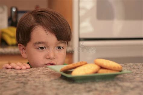 Wanting Some Cookies stock photo. Image of surprised, hair - 6213990