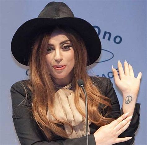 Top more than 71 lady gaga peace sign tattoo best - vova.edu.vn