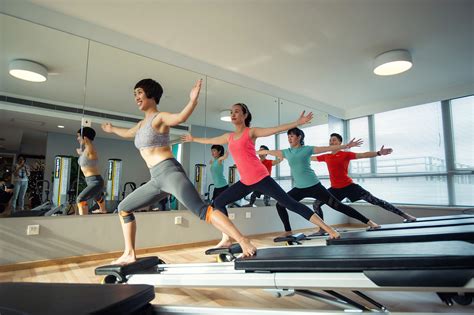Healthy Women Exercising on Workout Machine - High Quality Free Stock Images