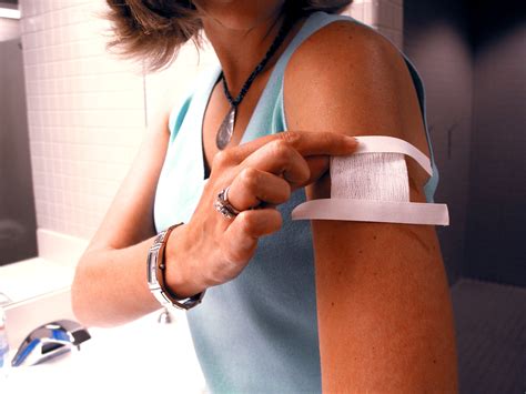 Free picture: smallpox, vaccinee, covers, vaccination, site, gauze, medical, tape, bandage