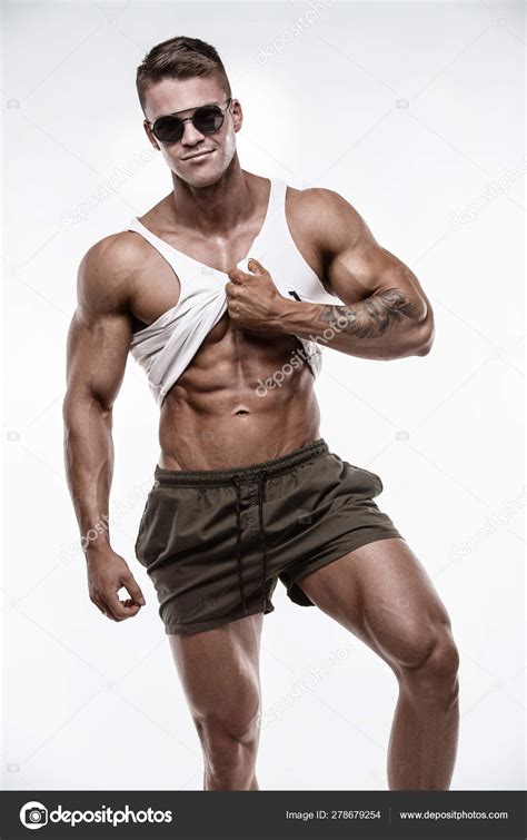 Strong Athletic Man shows body Stock Photo by ©_italo_ 278679254