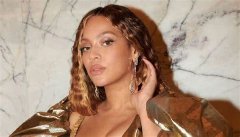 Beyoncé Sparkles in Silver Mini Dress to Pre-Grammys Party With Jay-Z ...