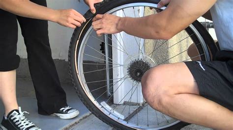 Tutorial: How to change a flat bike tire - YouTube