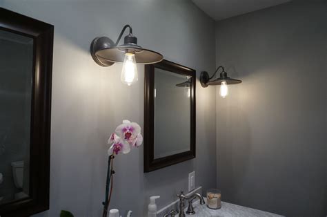 Bathroom wall sconces in transitional style master bathroom | Bathroom wall sconces, Master ...