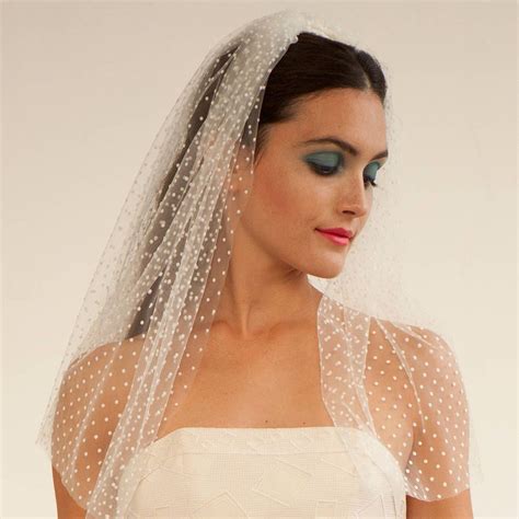 Are you interested in our polkadot veil ivory ? With our spot ivory ...