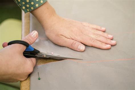 The Process of Cutting the Fabric Stock Image - Image of woman, cutting ...