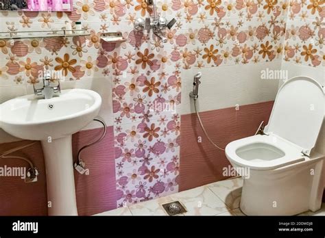 Pink toilet bathroom of a hotel room in Sinamangal, Kathmandu, Nepal ...