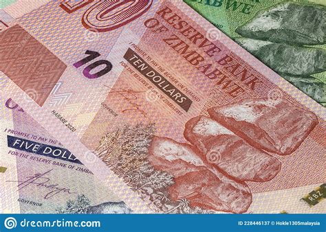 Close Up To Ten Dollars of the Republic of Zimbabwe. Paper Banknotes of the African Country ...