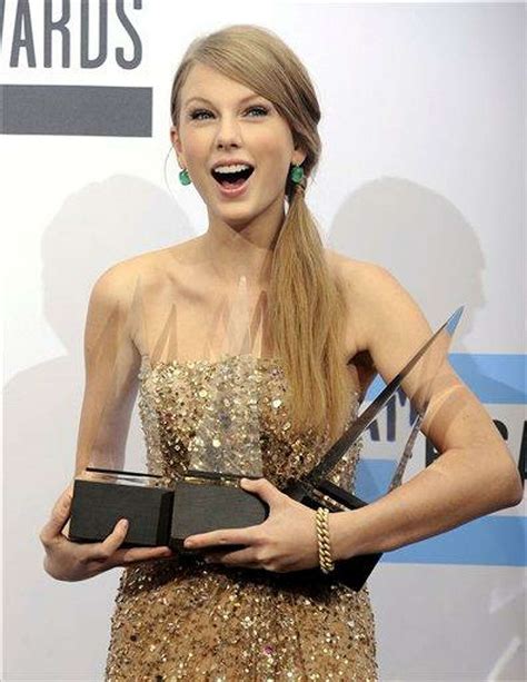 Taylor Swift wins three trophies at AMAs