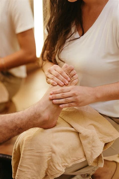 Man Getting a Foot Massage · Free Stock Photo