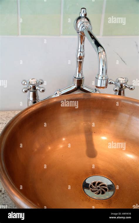 Copper bathroom sink Stock Photo - Alamy