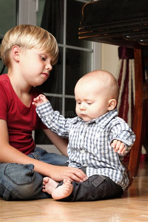 Little Boy Playing with a Brother Stock Photo - Image of model ...