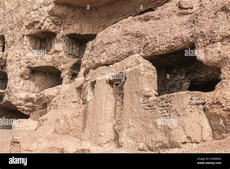 Caves in the cliffs near Bamiyan, Afghanistan Stock Photo - Alamy