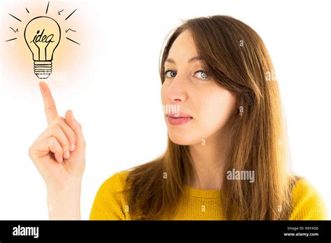 Woman pointing to illustration of light bulb. Idea concept Stock Photo - Alamy