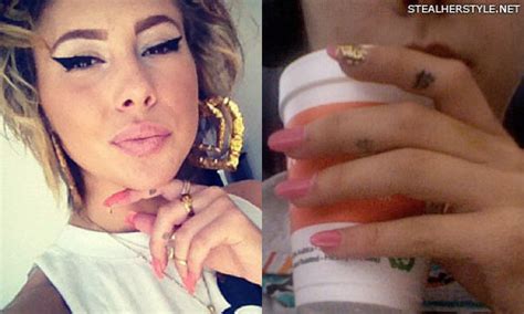 Lil Debbie's Dollar Sign Finger Tattoos | Steal Her Style