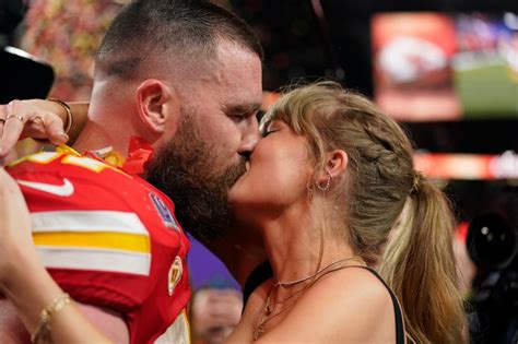 Taylor Swift and Travis Kelce kiss after Chiefs' Super Bowl 2024 win