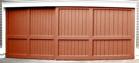 Custom Sliding Garage Doors | Non-warping patented wooden pivot door, sliding door, and Eco ...