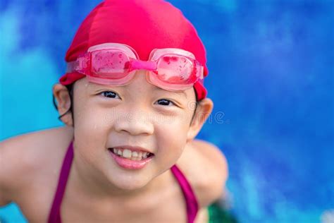 Child in Swimming Pool stock photo. Image of face, pool - 77799016