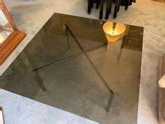 Square glass top coffee table with metal base