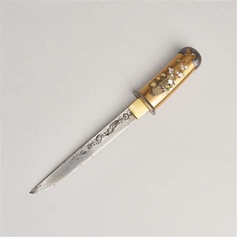 A Japanese Tanto with a gold lacquer sheath and handle | BADA