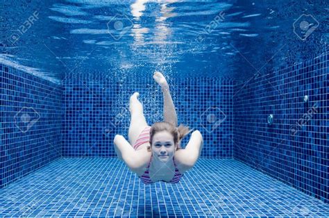 3720544-An-underwater-shot-of-a-woman-in-a-swimming-pool-Stock-Photo ...