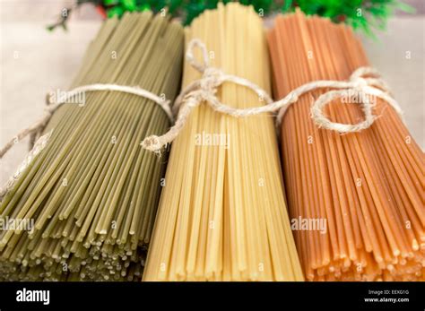 Spaghetti pasta in the colors of the Italian flag Stock Photo - Alamy