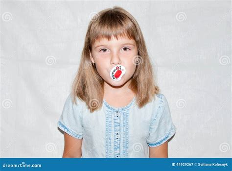 Girl with a pacifier stock image. Image of beautiful - 44929267