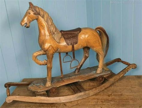 Antiques Atlas - ROCKING HORSE ANTIQUE EDWARDIAN 1906 HAND CARVED