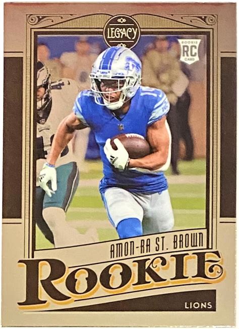 Amon-Ra St. Brown 2021 Panini Chronicles Football Legacy Rookie Card - KBK Sports