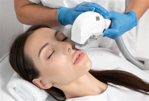 Elos Epilation Hair Removal Procedure on the Face of a Woman. Beautician Doing Laser ...