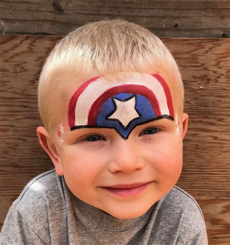 Captain America Face Paint Shield Design on Kid | Superhero face ...