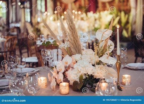 Rustic Wedding Decorations with Flowers and Candles. Banquet Decor Stock Image - Image of green ...