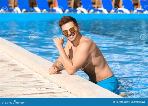 Handsome Young Man at Swimming Pool Edge on Sunny Stock Photo - Image ...