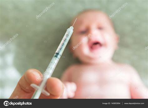 Baby Crying Over Vaccination — Stock Photo © AndreyPopov #140853954