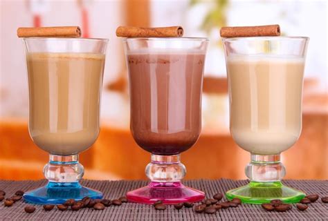 Premium Photo | Layered coffee in glass on table on bright background