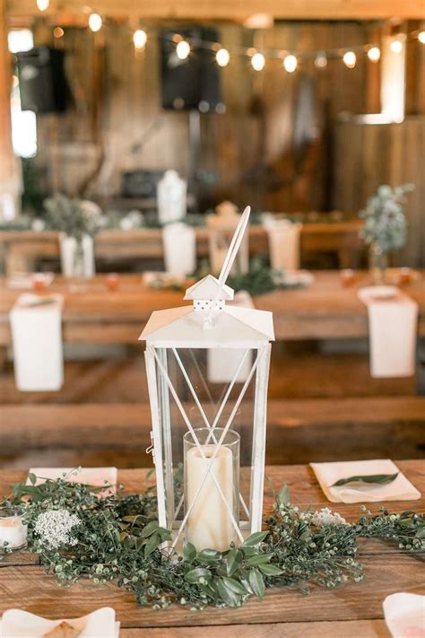 White Lantern Décor with Greenery