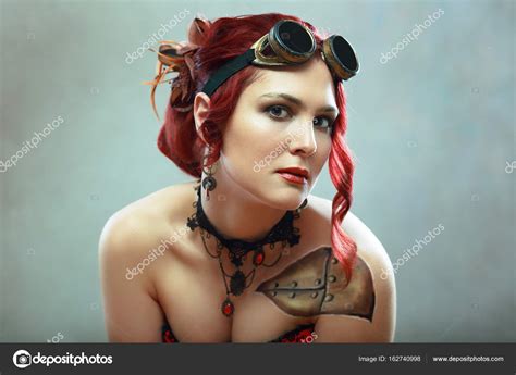 Redhead steampunk woman Stock Photo by ©lenanet 162740998