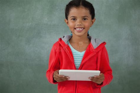 Young Girl Holding Digital Tablet Stock Photo - Image of child, internet: 96126890