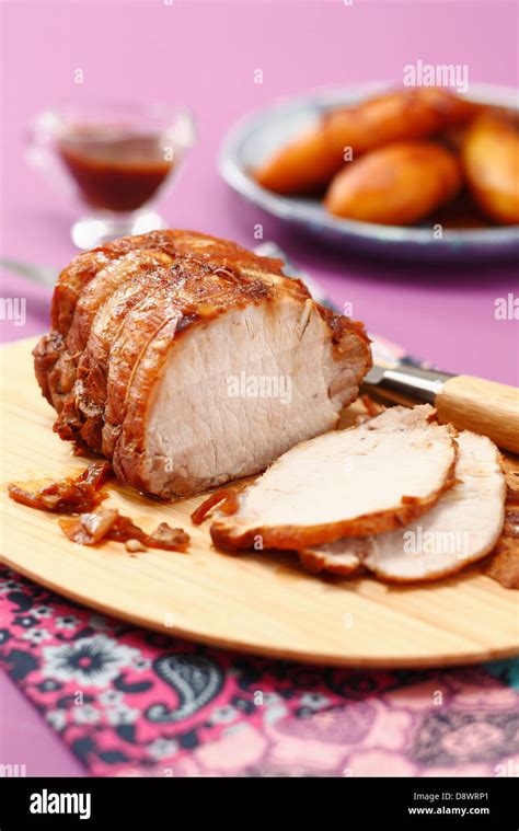 Roast pork with confit onions Stock Photo - Alamy